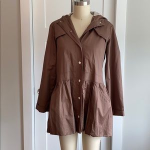 Cute raincoat full of details!